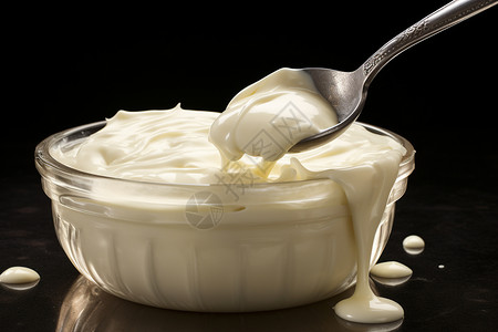 小勺搅拌着奶油背景图片