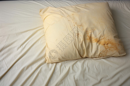 抱枕被被污渍弄脏的枕头背景