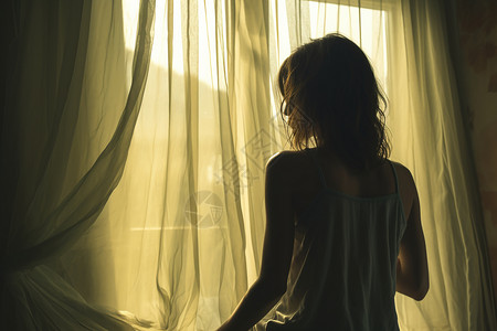 窗边独自伤感的女子背景图片