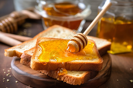 烤面包上的蜂蜜高清图片