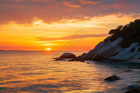 大海边的落日美景背景图片