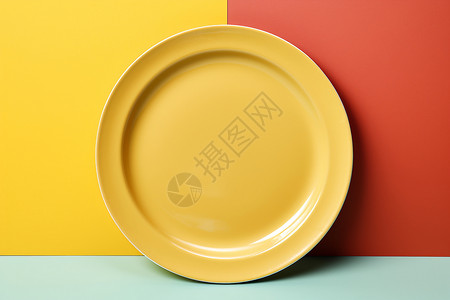 现代简约的黄色餐盘背景图片