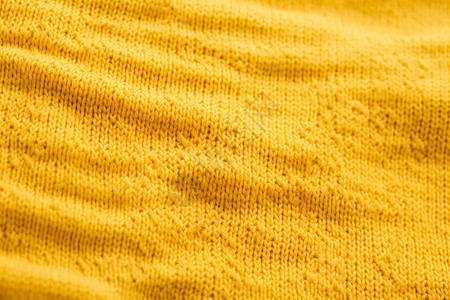 针织服饰柔软的黄色织物背景