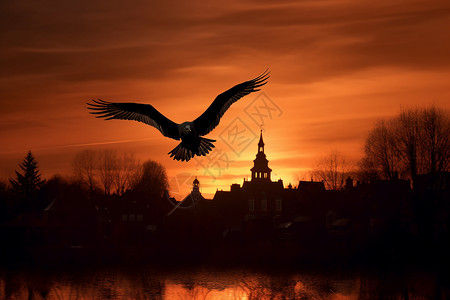 夕阳下老鹰翱翔在古堡上图片
