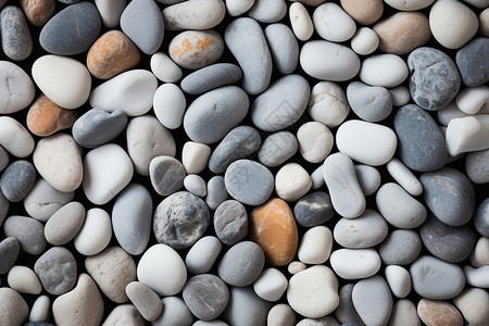 沙滩上的鹅卵石背景图片