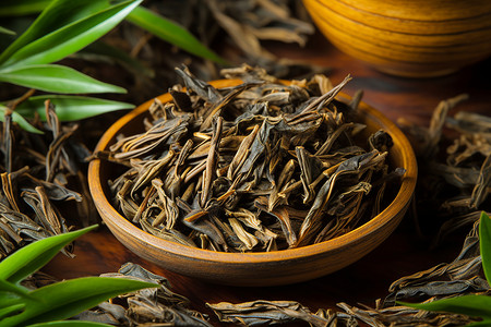 清香四溢木碗中新鲜的乌龙茶茶叶背景