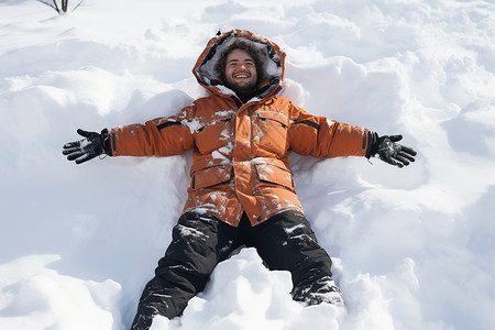 躺在雪地里穿着羽绒服的男子躺在雪地上背景