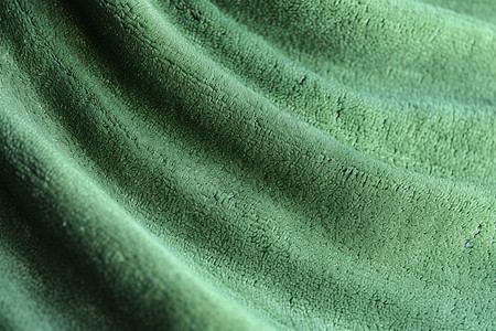 深绿色背景微型纤维布的纹理背景