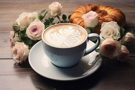 一杯咖啡点心和花束图片