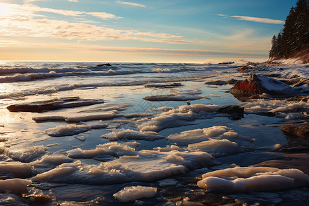 冰海沙滩下渐落的夕阳背景图片