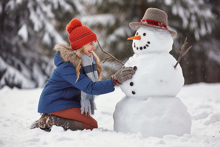 女孩在公园里堆雪人高清图片