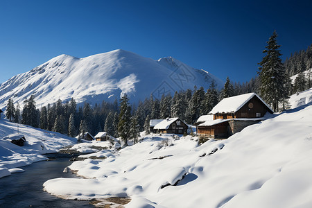 雪山覆盖的建筑小屋图片