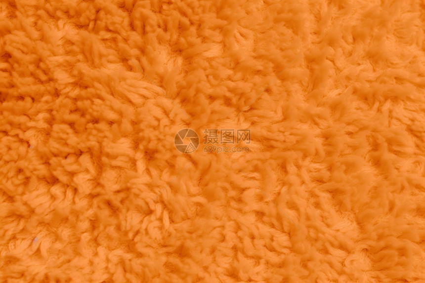 橙色地毯的特写图片