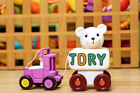 玩具火车上有一只玩具熊背景图片