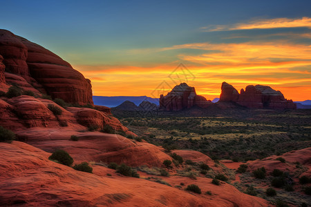 炫红日落后亚利桑那红岩的美丽景观背景