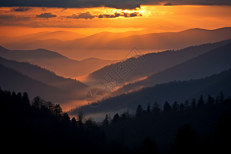 落日山顶背景落日下的山谷背景