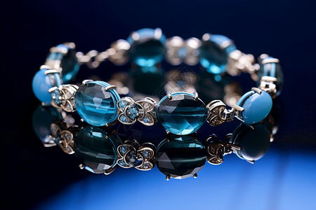 华丽手工制作的蓝色珠子银饰手链背景图片