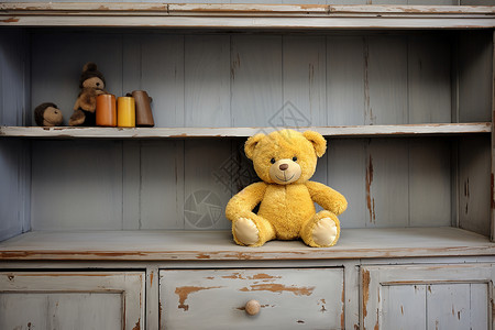 复古老式木柜上的玩具熊图片