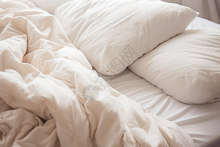 床上的被子和枕头背景图片