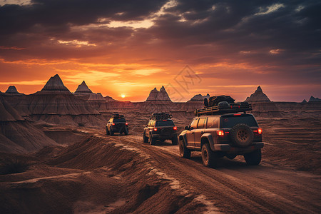 沙漠道路上的越野车背景图片