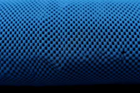纤维材质蓝色床垫的细节特写背景