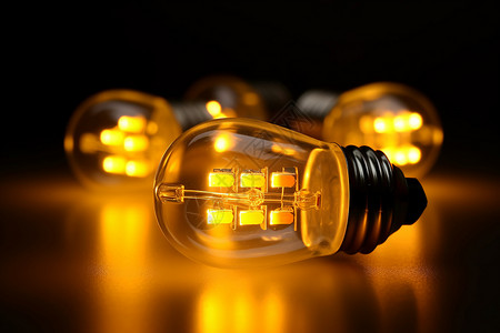 LED室内照明光芒四射的黄色灯泡设计图片