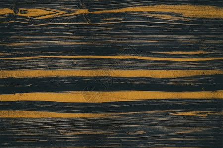 木桌上的黄色纹路背景图片