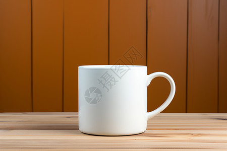 桌面上的白色陶瓷杯子背景图片