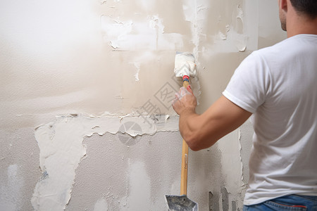 工人刷漆刷墙壁的维修工人背景