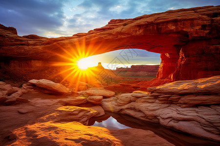 峡谷岩石太阳穿过红色岩石拱门背景