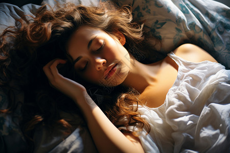床上熟睡的女人背景图片