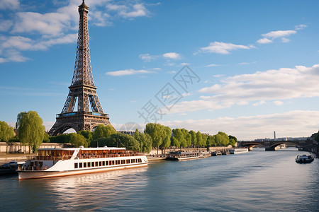 巴黎塔前一艘船沿着河流航行背景图片