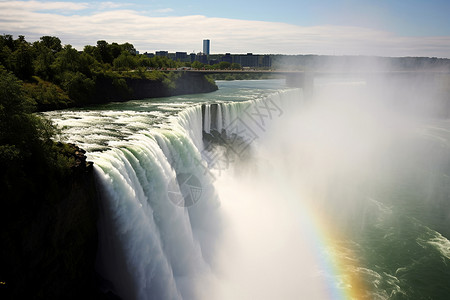 瀑布下美观的彩虹背景图片