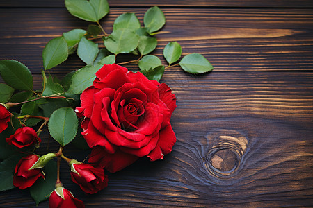 桌子上的红玫瑰背景图片