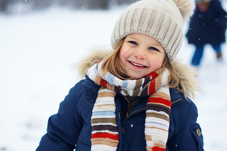 雪地里玩耍的小女孩背景图片