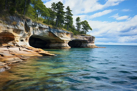 海上的岩洞背景图片