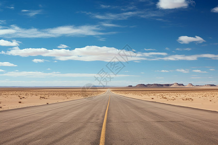 荒芜沙漠中的道路背景图片