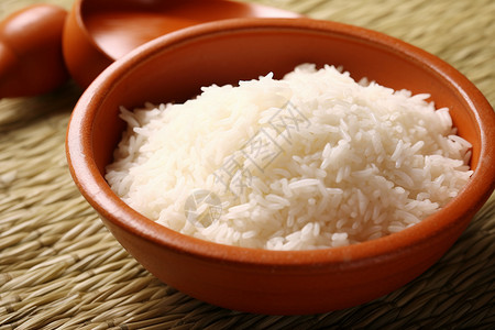 盛放在碗中的大米背景图片