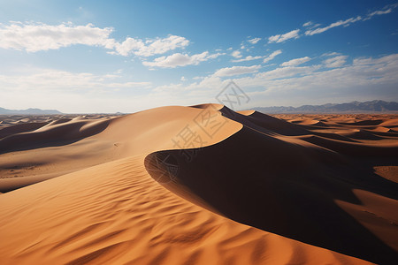 沙丘和山脉背景图片