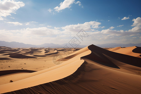 沙丘与蓝天云朵背景图片