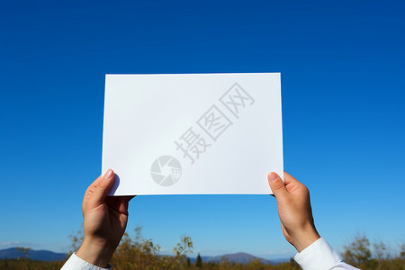 国庆宣传海报手举的空白纸张背景