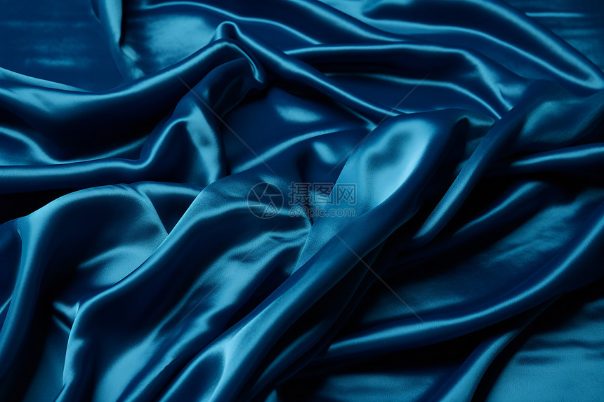 蓝色丝绸布料背景图片