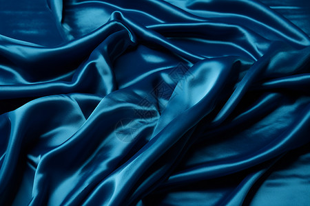 蓝色丝绸布料背景背景图片