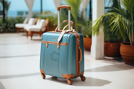 一个蓝色行李箱背景图片