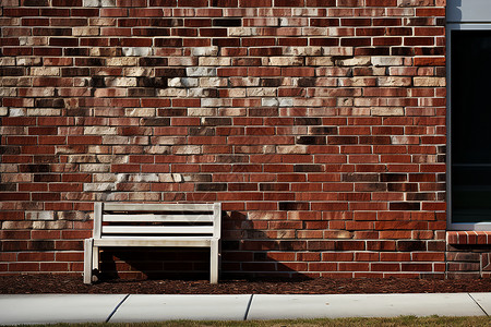 砖砌体砖砌建筑旁的一张椅子背景