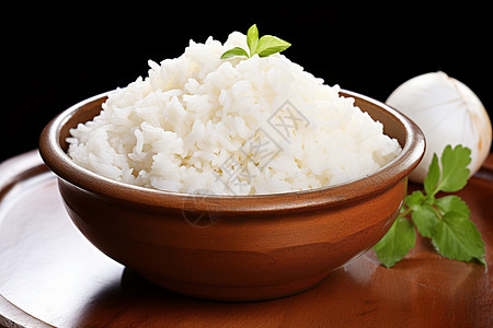 木桌上一碗米饭背景图片