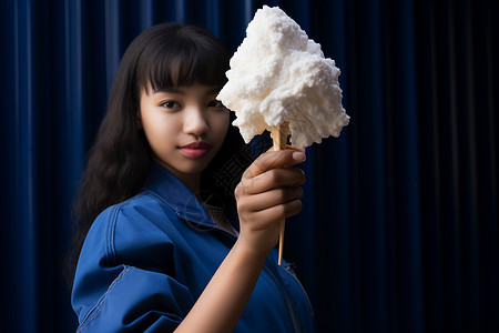 拿着棉花糖的漂亮女孩背景图片