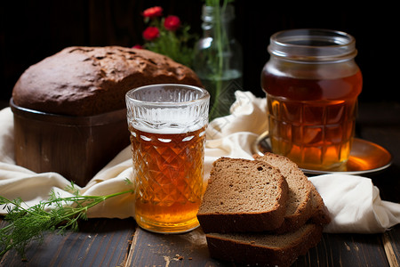 木桌上的面包和啤酒背景图片