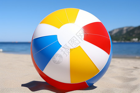 气球足球素材沙滩上放着一个充气的球背景