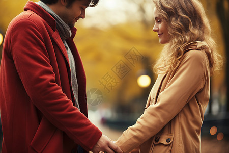 爱侣手牵手在公园中背景图片
